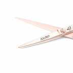 Close-up of 2030s laser precision convex edge blade on Ichiro Rose Gold cutting scissors