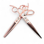 Ichiro rose gold set with hair cutting scissor overlaying the thinning scissor