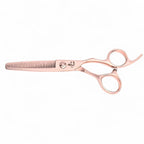 Side angle view of Ichiro Rose Gold thinning scissors showing offset handle and teeth