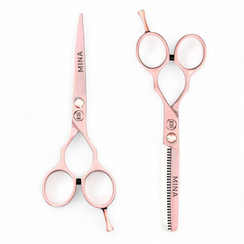 Complete Mina Classic pastel pink professional scissors set showing matching cutting and thinning scissors