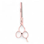 Mina Classic pastel pink thinning scissors top view showing 30 V-shaped teeth and rose gold accents